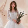 Chic / Beautiful White See-through Wedding Dresses 2018 Ball Gown Scoop Neck Long Sleeve Backless Appliques Lace Pearl Ruffle Royal Train