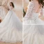 Chic / Belle Blanche Transparentes Robe De Mariée 2018 Robe Boule Encolure Dégagée Manches Longues Dos Nu Appliques En Dentelle Perle Volants Royal Train