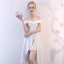 Unique Blanche de retour Robe De Graduation 2018 Princesse De l'épaule Manches Courtes Asymétrique Volants Dos Nu Robe De Ceremonie