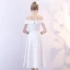 Unique Blanche de retour Robe De Graduation 2018 Princesse De l'épaule Manches Courtes Asymétrique Volants Dos Nu Robe De Ceremonie
