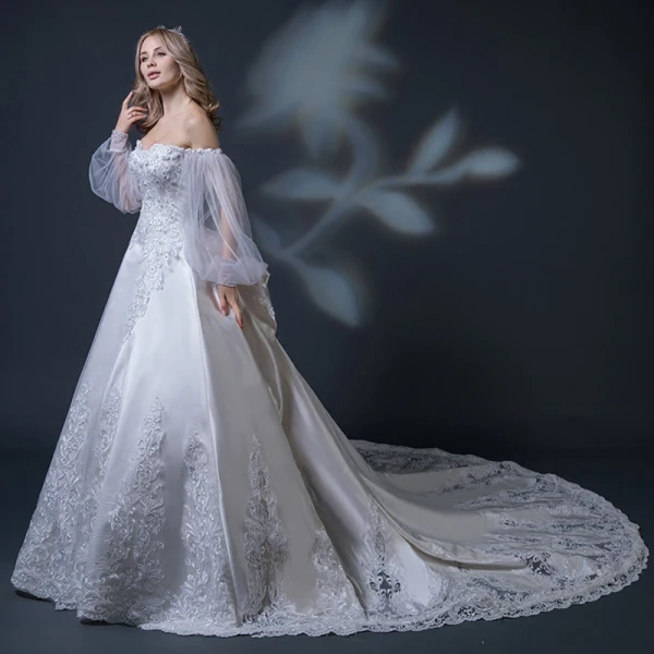 Elegant Champagne Wedding Dresses 2018 Ball Gown Off-The-Shoulder Long Sleeve Backless Appliques Lace Beading Ruffle Cathedral Train