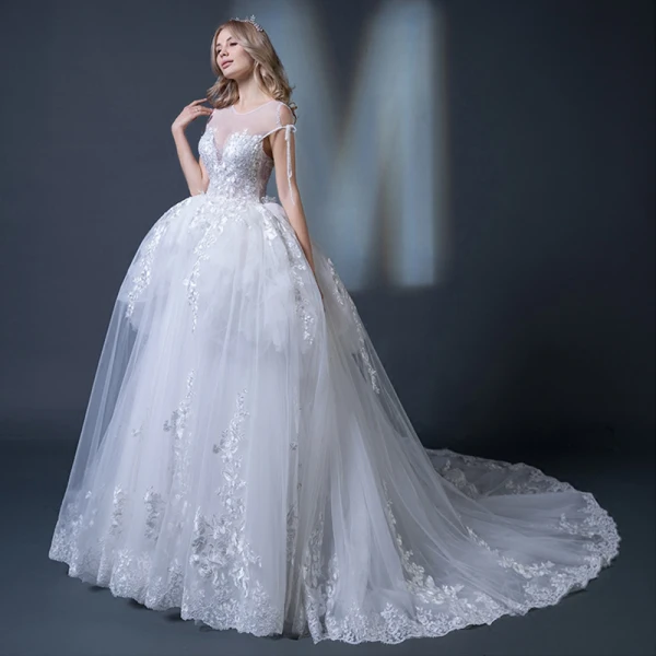 Élégant Blanche Transparentes Robe De Mariée 2018 Robe Boule Encolure Dégagée Dos Nu Appliques En Dentelle Perlage Volants Chapel Train