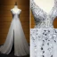 Luxus / Herrlich Grau Abendkleider 2017 A Linie V-Ausschnitt Ärmellos Perlenstickerei Kristall Pailletten Perle Strass Gespaltete Front Sweep / Pinsel Zug Plissee Durchbohrt Rückenfreies Festliche Kleider