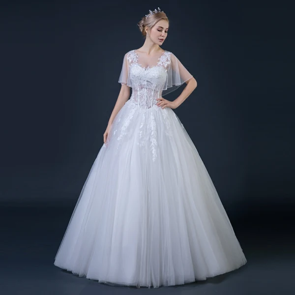Abordable Blanche Transparentes Robe De Mariée Avec Châle 2018 Robe Boule Encolure Dégagée Dos Nu Appliques Percé En Dentelle Perlage Volants Longue