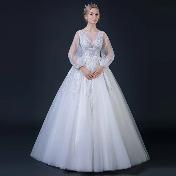 Abordable Blanche Transparentes Robe De Mariée 2018 Robe Boule V-Cou Manches Longues Dos Nu Appliques En Dentelle Faux Diamant Perlage Volants Longue