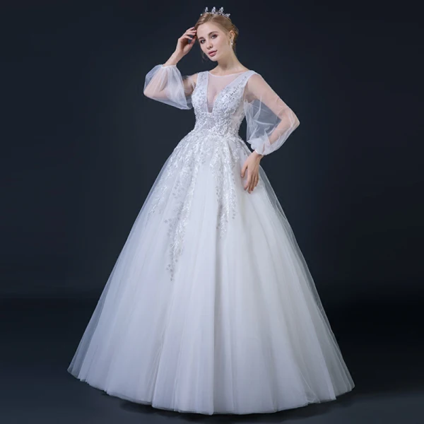 Abordable Blanche Transparentes Robe De Mariée 2018 Robe Boule V-Cou Manches Longues Dos Nu Appliques En Dentelle Faux Diamant Perlage Volants Longue