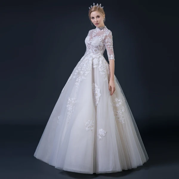 Illusion Champagne Pierced Wedding Dresses 2018 A-Line / Princess High Neck 1/2 Sleeves Appliques Lace Ruffle Floor-Length / Long