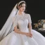 Élégant Haut de Gamme Ivoire Robe Boule Robe De Mariée 2021 Encolure Dégagée Perlage En Dentelle Fleur Manches Courtes Dos Nu Royal Train Mariage