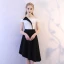 Unique Noir Blanche de retour Robe De Graduation 2018 Princesse De l'épaule Dos Nu Sans Manches Mi-Longues Robe De Ceremonie