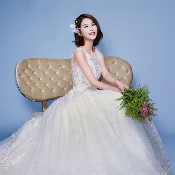 Élégant Ivoire Robe De Mariée 2019 Princesse Encolure Dégagée Appliques Perle En Dentelle Fleur Sans Manches Dos Nu Cathedral Train