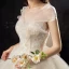 Audrey Hepburn Style Champagne Wedding Dresses 2019 Ball Gown Scoop Neck Lace Flower Short Sleeve Backless Cathedral Train