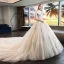 Elegante Champagne Trouwjurken 2019 Baljurk Ronde Hals Kralen Kant Bloem Kapmouwen Ruglooze Royal Train