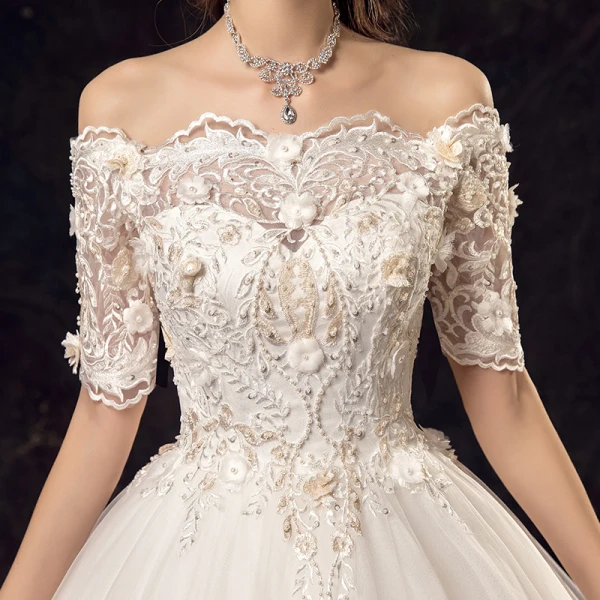 Élégant Ivoire Robe De Mariée 2019 Princesse De l'épaule Perlage Appliques Perle En Dentelle Fleur Manches Courtes Dos Nu Chapel Train