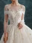 Élégant Champagne Robe De Mariée 2019 Princesse Encolure Dégagée En Dentelle Fleur Manches Longues Dos Nu Cathedral Train