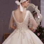 Charmant Champagner Brautkleider / Hochzeitskleider Ballkleid 2019 Tiefer V-Ausschnitt Perlenstickerei Quaste Perle Spitze Blumen Pailletten Kurze Ärmel Rückenfreies Königliche Schleppe