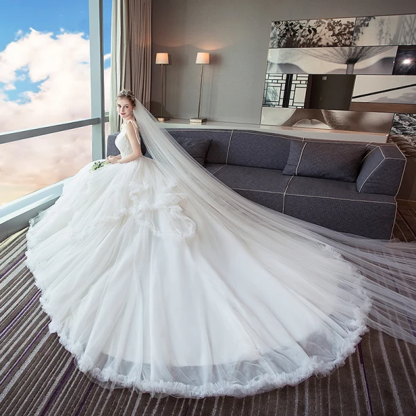 Schöne Ivory / Creme Brautkleider / Hochzeitskleider 2019 A Linie Spaghettiträger Perlenstickerei Spitze Blumen Ärmellos Rückenfreies Fallende Rüsche Kathedrale Schleppe