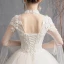 Élégant Champagne Robe De Mariée 2019 Princesse Col Haut Appliques En Dentelle Fleur Perlage Perle Paillettes Manches Longues Dos Nu Longue