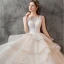 Charming Champagne Wedding Dresses 2019 Ball Gown V-Neck Pearl Sleeveless Backless Cascading Ruffles Cathedral Train
