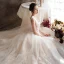 Schöne Ivory / Creme Brautkleider / Hochzeitskleider 2019 A Linie V-Ausschnitt Perlenstickerei Pailletten Perle Spitze Blumen Ärmellos Rückenfreies Kapelle-Schleppe