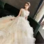 Fabulous Champagne Wedding Dresses 2019 Ball Gown Spaghetti Straps Ruffle Lace Flower Sequins Sleeveless Backless Royal Train