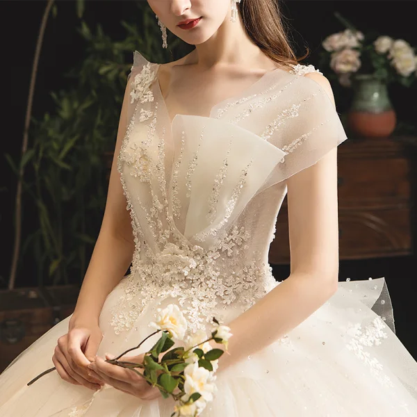 Classy Champagne Wedding Dresses 2019 Ball Gown V-Neck Sequins Lace Flower Sleeveless Backless Court Train