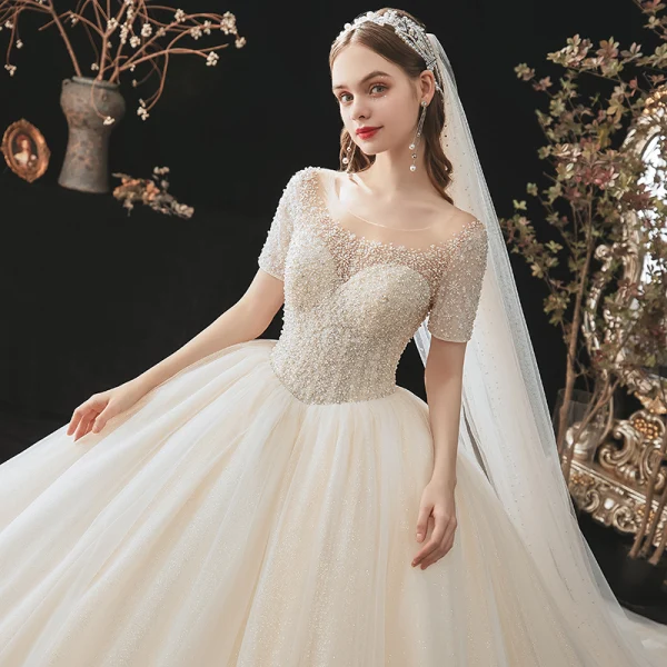 Modern / Fashion Champagne Wedding Dresses 2021 Ball Gown Scoop Neck Beading Pearl Sequins Short Sleeve Backless Royal Train Wedding