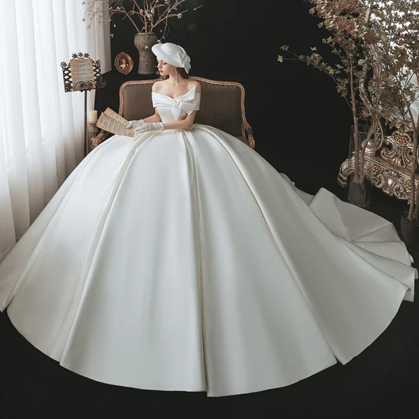 Modest / Simple Elegant Ivory Satin Wedding Dresses 2021 Ball Gown Off-The-Shoulder Bow Short Sleeve Backless Royal Train Wedding