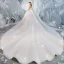 Fantastisk Champagne Bröllopsklänningar 2019 Balklänning Urringning Beading Paljetter Spets Blomma Ärmlös Halterneck Royal Train