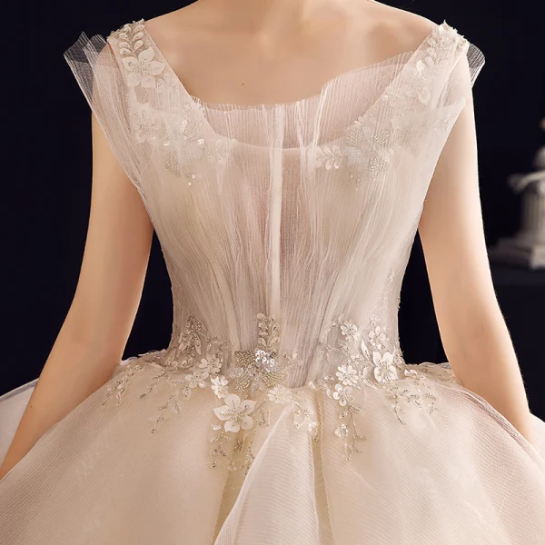 Charming Champagne Wedding Dresses 2020 Ball Gown Ruffle V-Neck Beading Pearl Lace Appliques Sequins Sleeveless Backless Royal Train