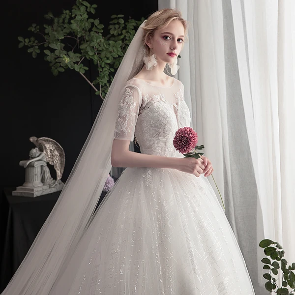 Élégant Ivoire Robe De Mariée 2019 Princesse Encolure Dégagée Perlage Paillettes En Dentelle Fleur Manches Courtes Dos Nu Cathedral Train