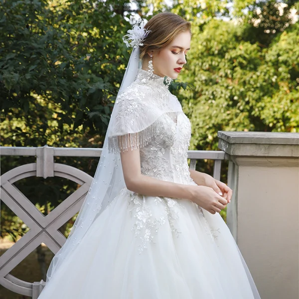 Fashion Ivory Wedding Dresses 2020 Ball Gown High Neck Beading Tassel Sequins Lace Flower Appliques Cap Sleeves Cathedral Train