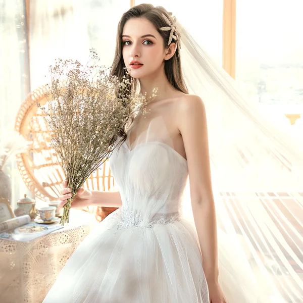 Charming Ivory Wedding Dresses 2020 Ball Gown Strapless Rhinestone Lace Flower Sleeveless Backless Royal Train