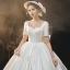 Haut de Gamme Élégant Ivoire Satin Robe De Mariée 2021 Robe Boule Perle Encolure Carrée Manches Courtes Dos Nu Noeud Royal Train Mariage