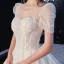 Luxe Champagne Robe De Mariée 2020 Princesse Encolure Dégagée Perlage Gland Paillettes En Dentelle Fleur Manches Courtes Dos Nu Royal Train