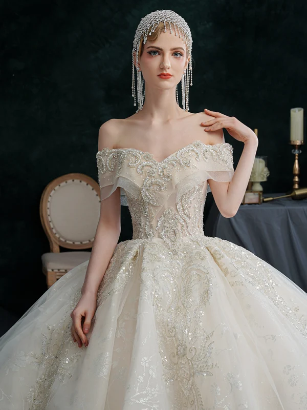 Illusion Champagne Wedding Dresses 2021 Ball Gown Off-The-Shoulder Beading Pearl Rhinestone Sequins Short Sleeve Backless Royal Train Wedding
