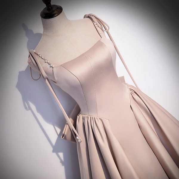 Elegante Champagner Satin Ballkleider 2022 A Linie Spaghettiträger Perlenstickerei Perle Ärmellos Rückenfreies Schleife Lange Festliche Kleider