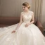 Moderne / Mode Champagne Robe De Mariée 2018 Robe Boule En Dentelle Appliques Perlage Paillettes Encolure Dégagée Dos Nu Sans Manches Royal Train Mariage