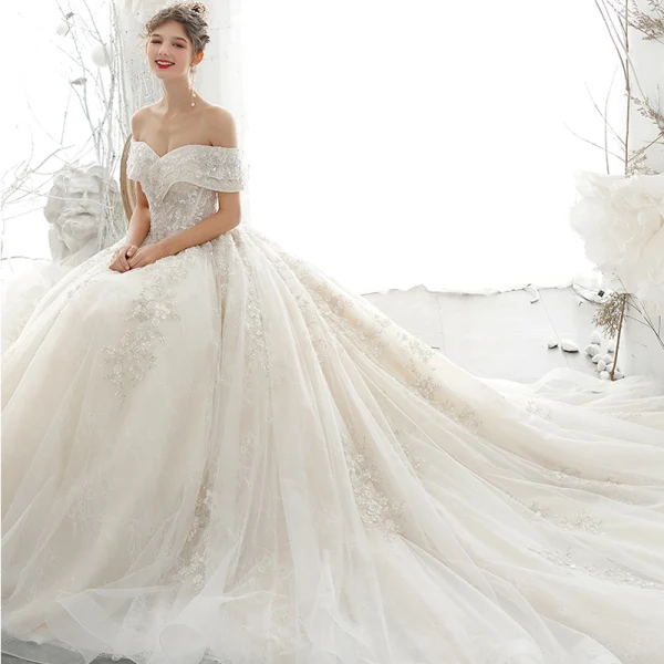 Luxury / Gorgeous Champagne Wedding Dresses 2020 A-Line / Princess Off-The-Shoulder Beading Pearl Sequins Lace Flower Appliques Short Sleeve Backless Royal Train
