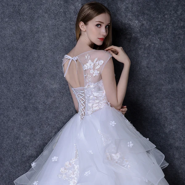Elegant White Wedding Dresses 2018 Ball Gown Beading Appliques Bow Scoop Neck Backless Sleeveless Cathedral Train Wedding