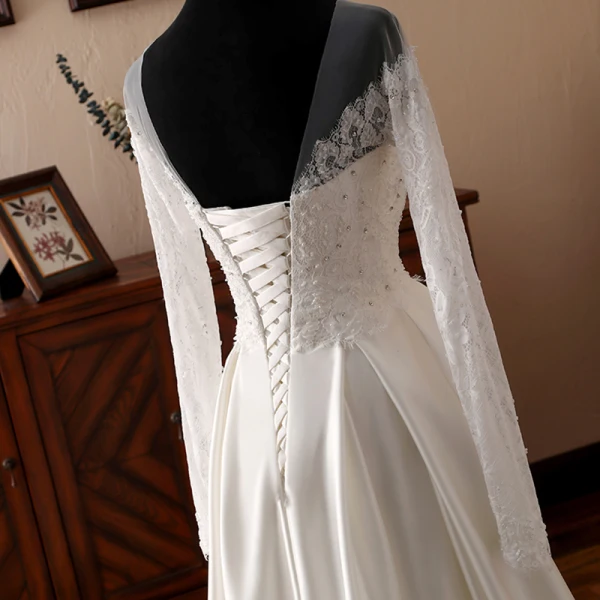 Elegante Ivory / Creme Durchsichtige Brautkleider 2018 A Linie Rundhalsausschnitt Lange Ärmel Rückenfreies Applikationen Mit Spitze Strass Rüschen Lange