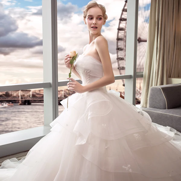 Elegant Ivory Wedding Dresses 2018 Ball Gown Lace Flower Pearl Cascading Ruffles Strapless Backless Sleeveless Royal Train Wedding