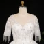 Luxury / Gorgeous Ivory Plus Size Ball Gown Wedding Dresses 2021 Crossed Straps 1/2 Sleeves V-Neck Tulle Satin Lace Handmade  Beading Backless Appliques Tassel Cathedral Train Wedding