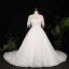 Luxury / Gorgeous Ivory Plus Size Ball Gown Wedding Dresses 2021 Crossed Straps 1/2 Sleeves V-Neck Tulle Satin Lace Handmade  Beading Backless Appliques Tassel Cathedral Train Wedding
