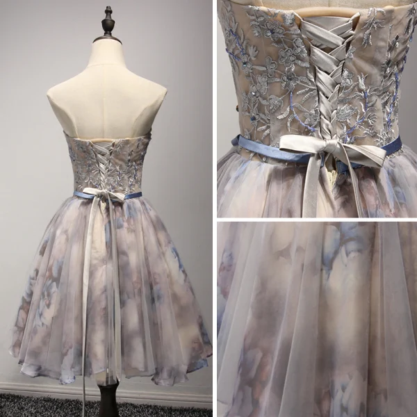 Mote Champagne Homecoming Graduation Kjoler 2017 Ballkjole Kjæreste Uten Ermer Appliques Beading Blonder Sash Printing Korte Buste Ryggløse Formelle Kjoler