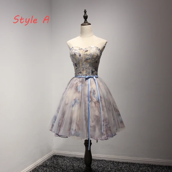 Mote Champagne Homecoming Graduation Kjoler 2017 Ballkjole Kjæreste Uten Ermer Appliques Beading Blonder Sash Printing Korte Buste Ryggløse Formelle Kjoler