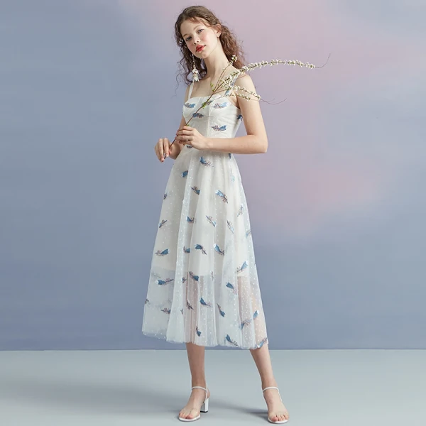 Chic / Belle Ivoire Été de retour Robe De Graduation 2018 Princesse épaules Sans Manches Tachetée Impression Thé Longueur Volants Dos Nu Robe De Ceremonie