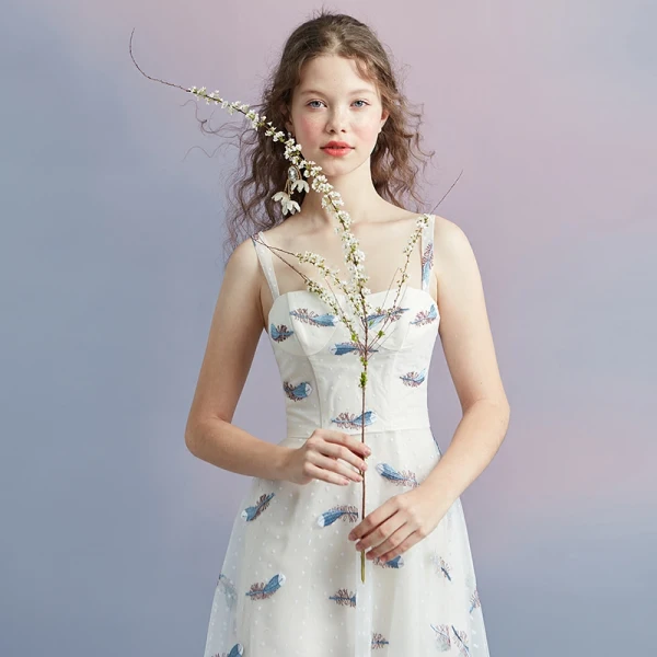 Chic / Belle Ivoire Été de retour Robe De Graduation 2018 Princesse épaules Sans Manches Tachetée Impression Thé Longueur Volants Dos Nu Robe De Ceremonie