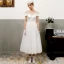 Vintage / Retro Ivory Wedding Dresses 2018 A-Line / Princess Off-The-Shoulder Short Sleeve Backless Tea-length Ruffle