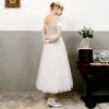 Vintage / Retro Ivory Wedding Dresses 2018 A-Line / Princess Off-The-Shoulder Short Sleeve Backless Tea-length Ruffle