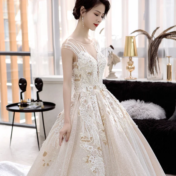 Luxury / Gorgeous Champagne Wedding Dresses 2018 Ball Gown Scoop Neck Sleeveless Backless Appliques Lace Glitter Tulle Ruffle Cathedral Train